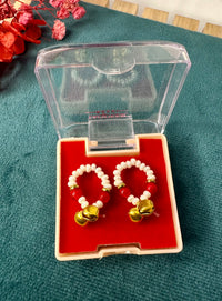 • 1 Handmade Laddoo Gopal Rakhi • 1 Glass Bottle Roli & Chawal Set • 1 Treats Hamper containing KitKat and assorted toffees