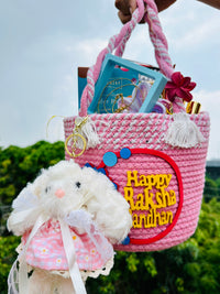 JUGNU STORE Raksha Bandhan Gift Hamper for Sister or Sister in Law | Premium Pink Gift Basket with Anti Tarnish Pendant, Plush Bunny Keychain, Hair Accessories, Mini Perfume Set, Ferrero Rocher, Nachos, Maza & Chocolates | Rakhi Gift for Girls & Women