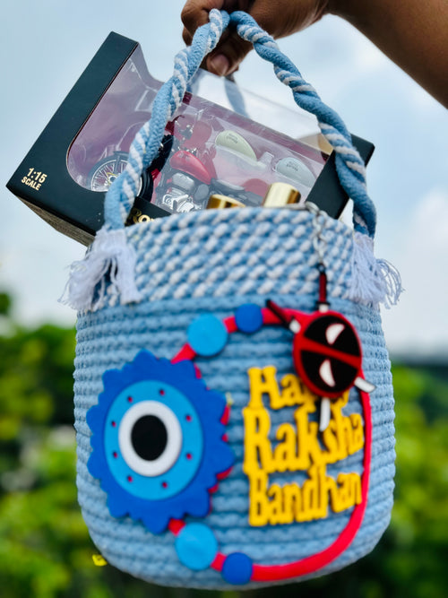 JUGNU STORE Rakhi Gift Hamper for Brother | Premium Handmade Cotton Basket with Royal Enfield Bike Model, Mini Perfume Set, Ferrero Rocher, Maza, Nachos, Choco Sticks, Keychain | Ready-to-Gift Raksha Bandhan Gift Combo for Men